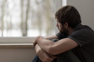 oceanfrontsoberliving-8-reasons-men-keep-their-depression-secret-article-photo-portrait-of-young-man-suffering-for-depression-272173868